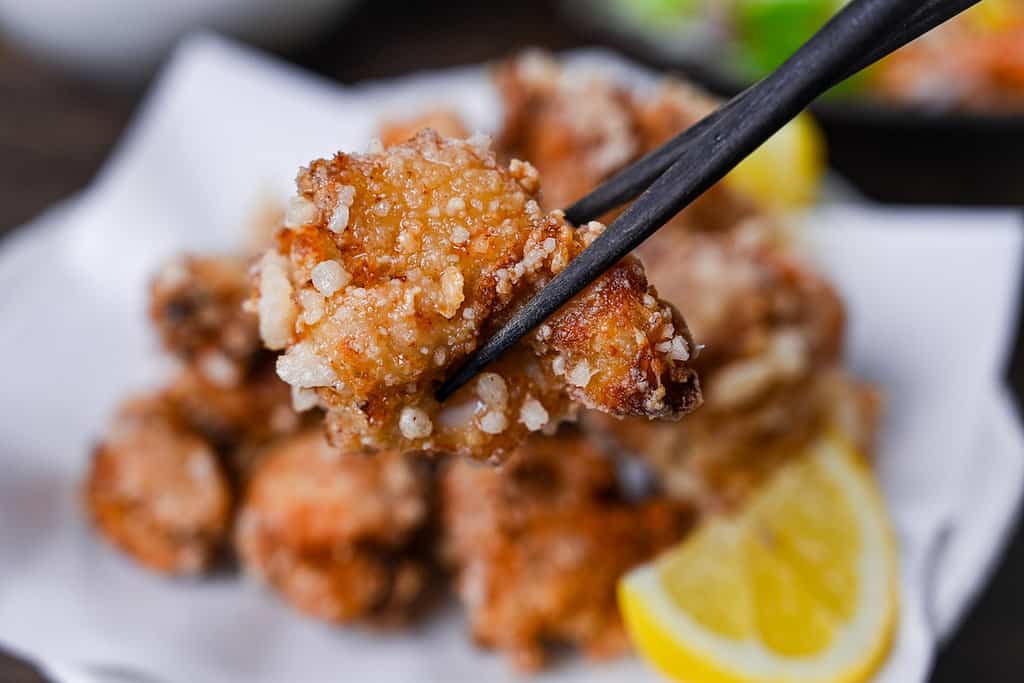 Authentic Japanese chicken karaage served with a slice of lemon