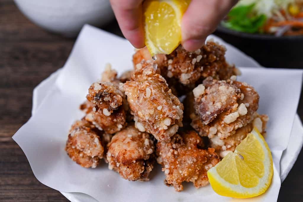 Authentic Japanese chicken karaage served with a slice of lemon