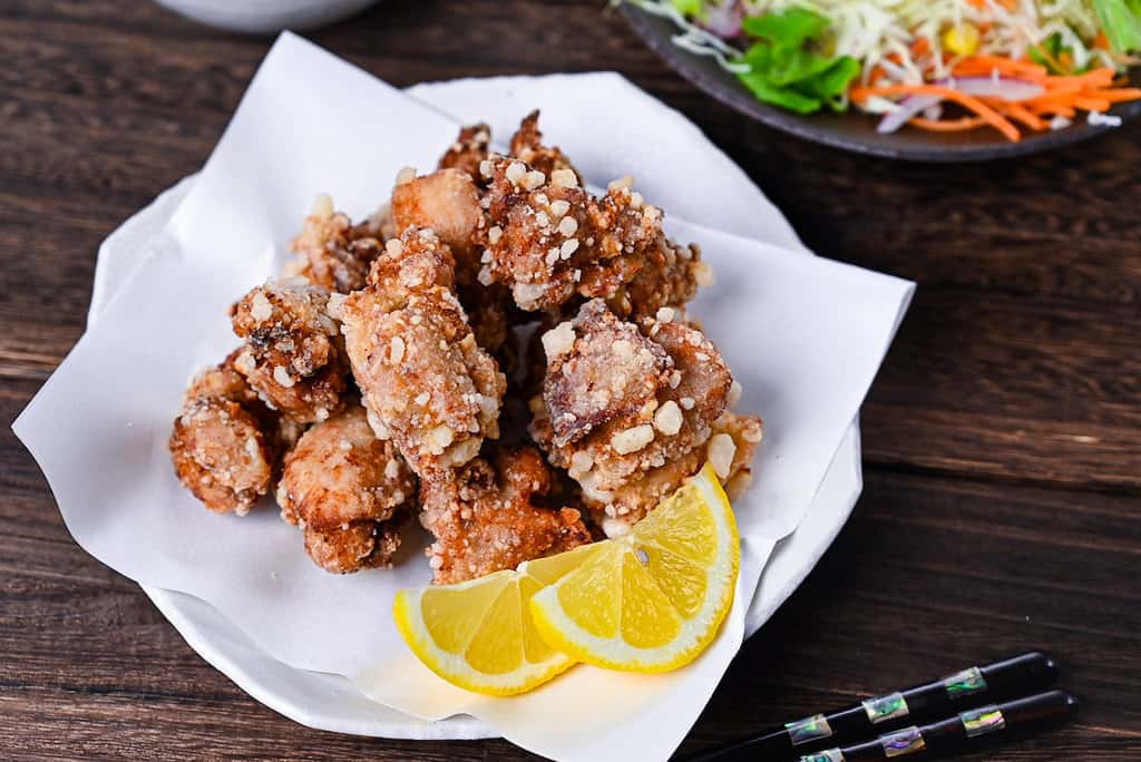 Authentic Japanese chicken karaage served with a slice of lemon