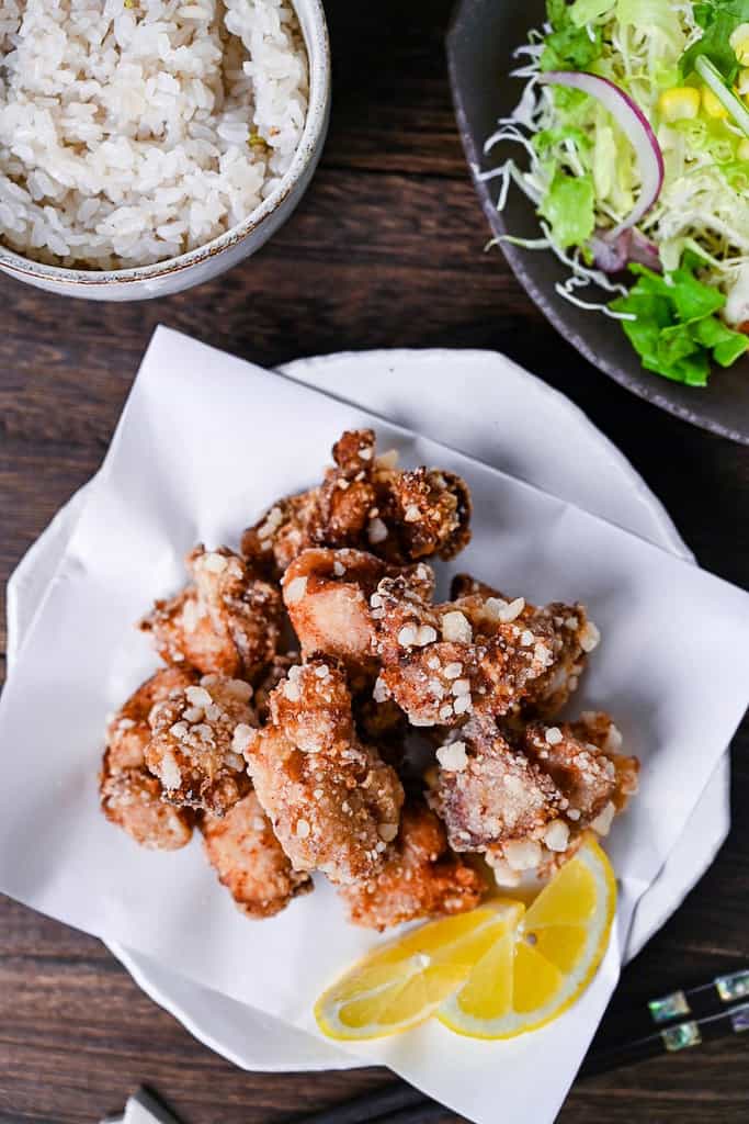 Authentic Japanese chicken karaage served with a slice of lemon