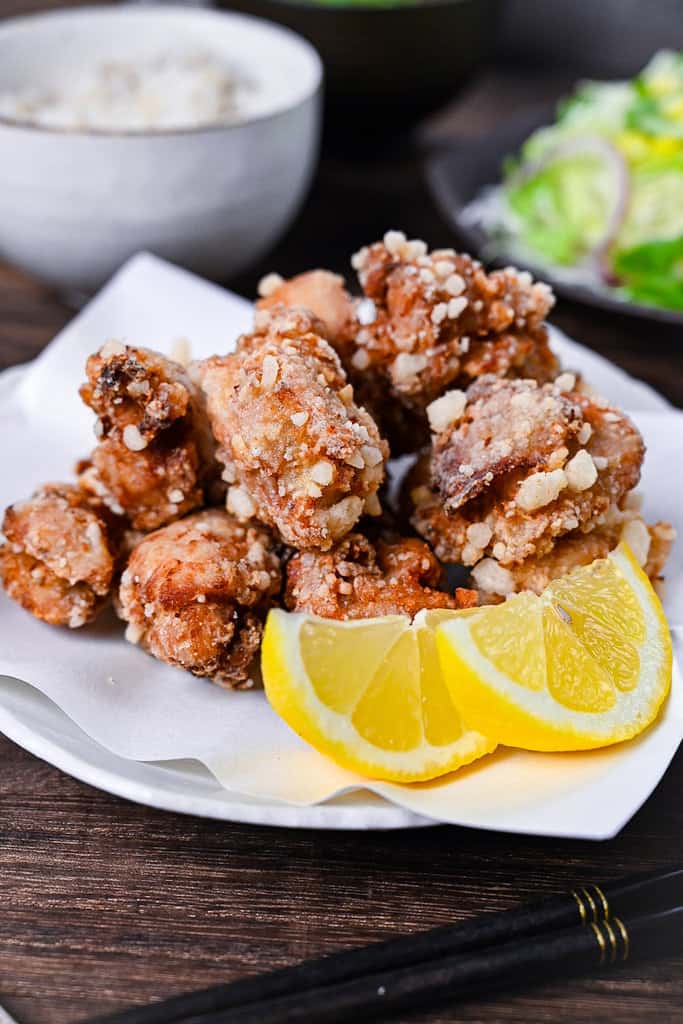 Authentic Japanese chicken karaage served with a slice of lemon