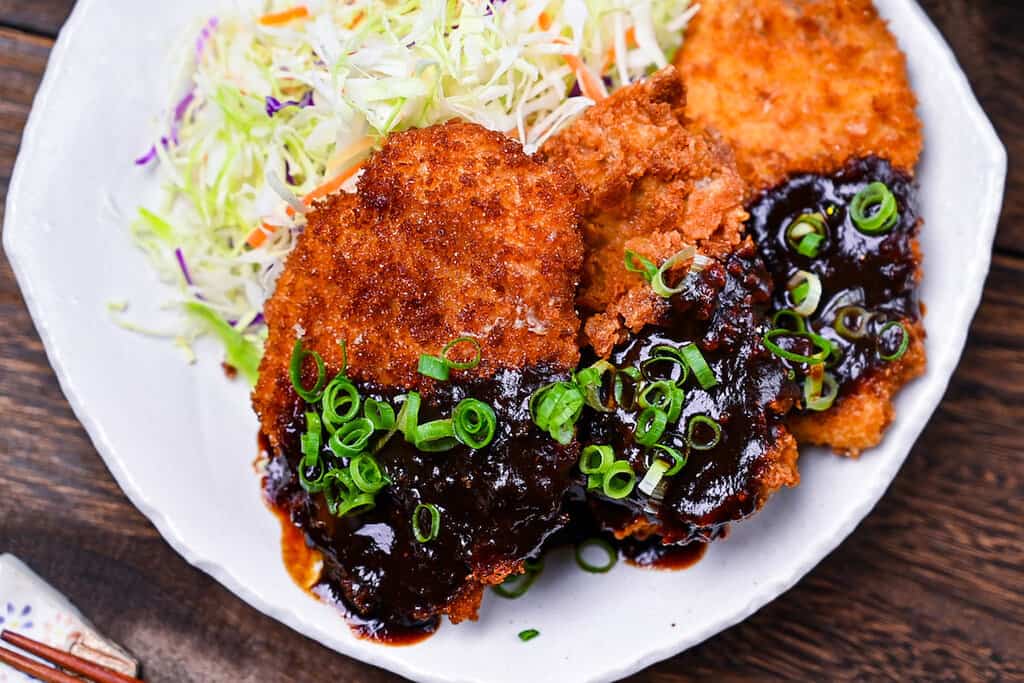 Hire katsu (breaded pork medallions) with Nagoya red miso sauce, shredded cabbage, miso soup and rice