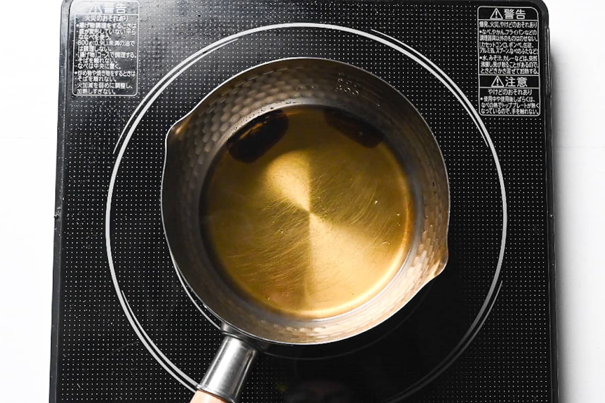 sugar turning golden in sauce pan