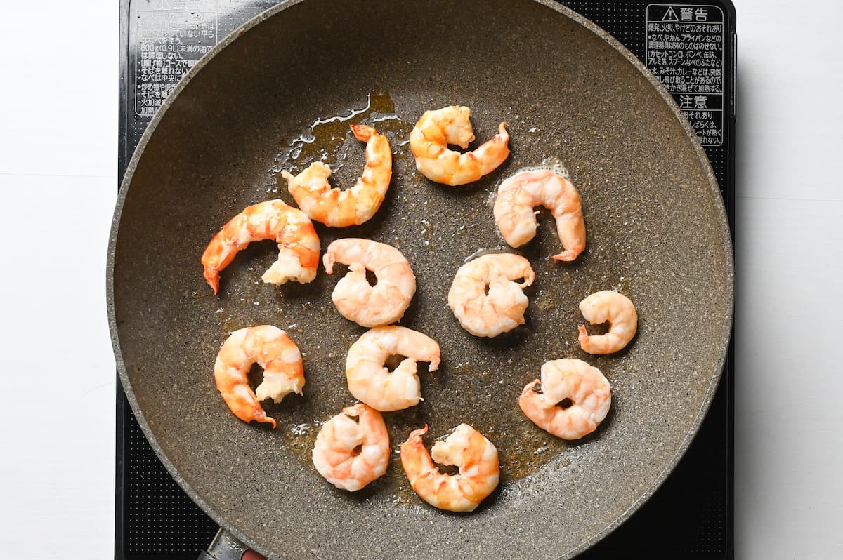 frying shrimp in pan