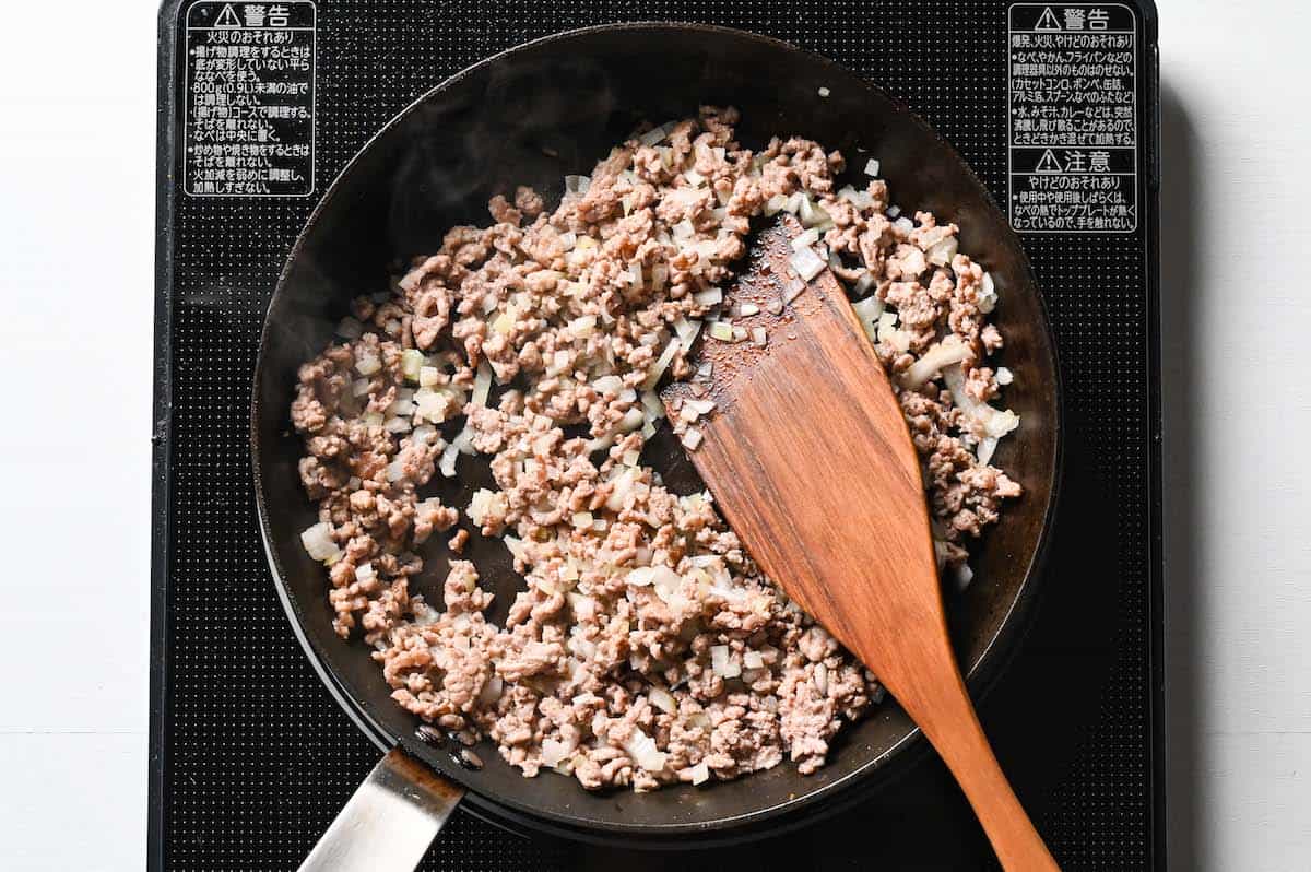 frying onions with meat for mabo tofu