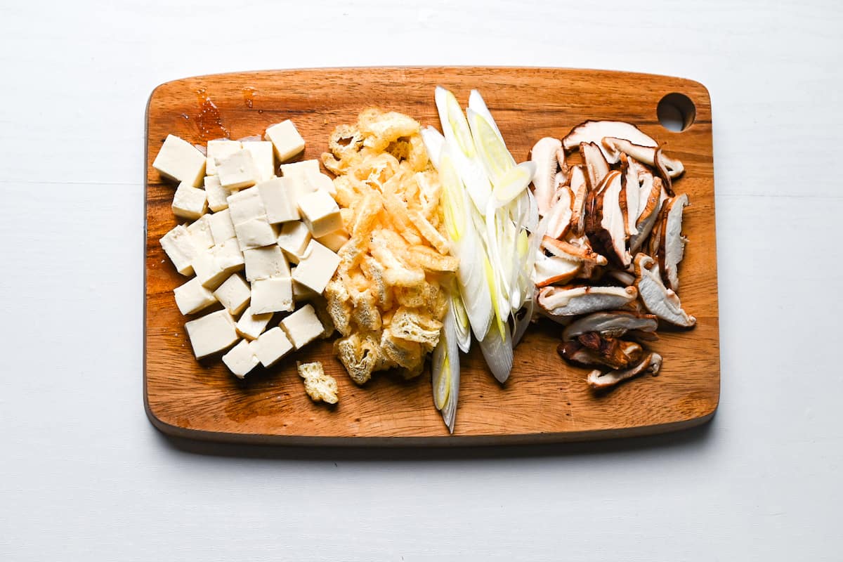 cut ingredients on a wooden chopping board for miso soup