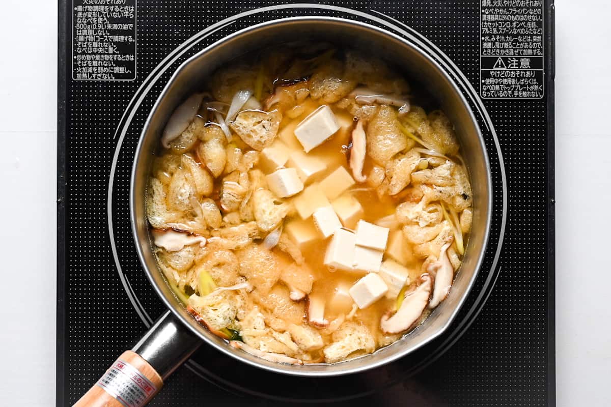 cooking tofu in residual heat of miso soup