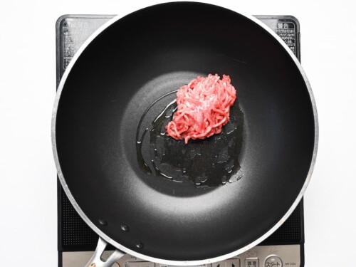 ground meat in a wok