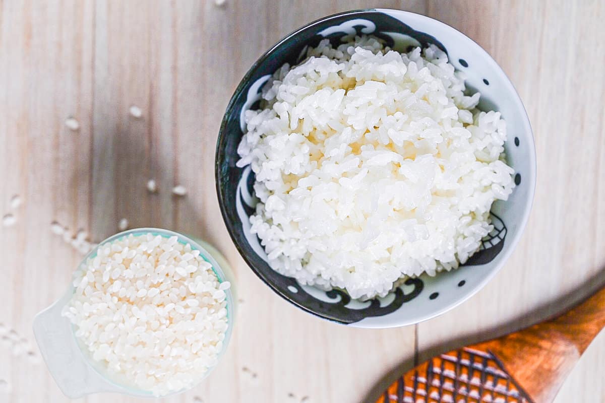 Japanese short grain white rice cooked and uncooked