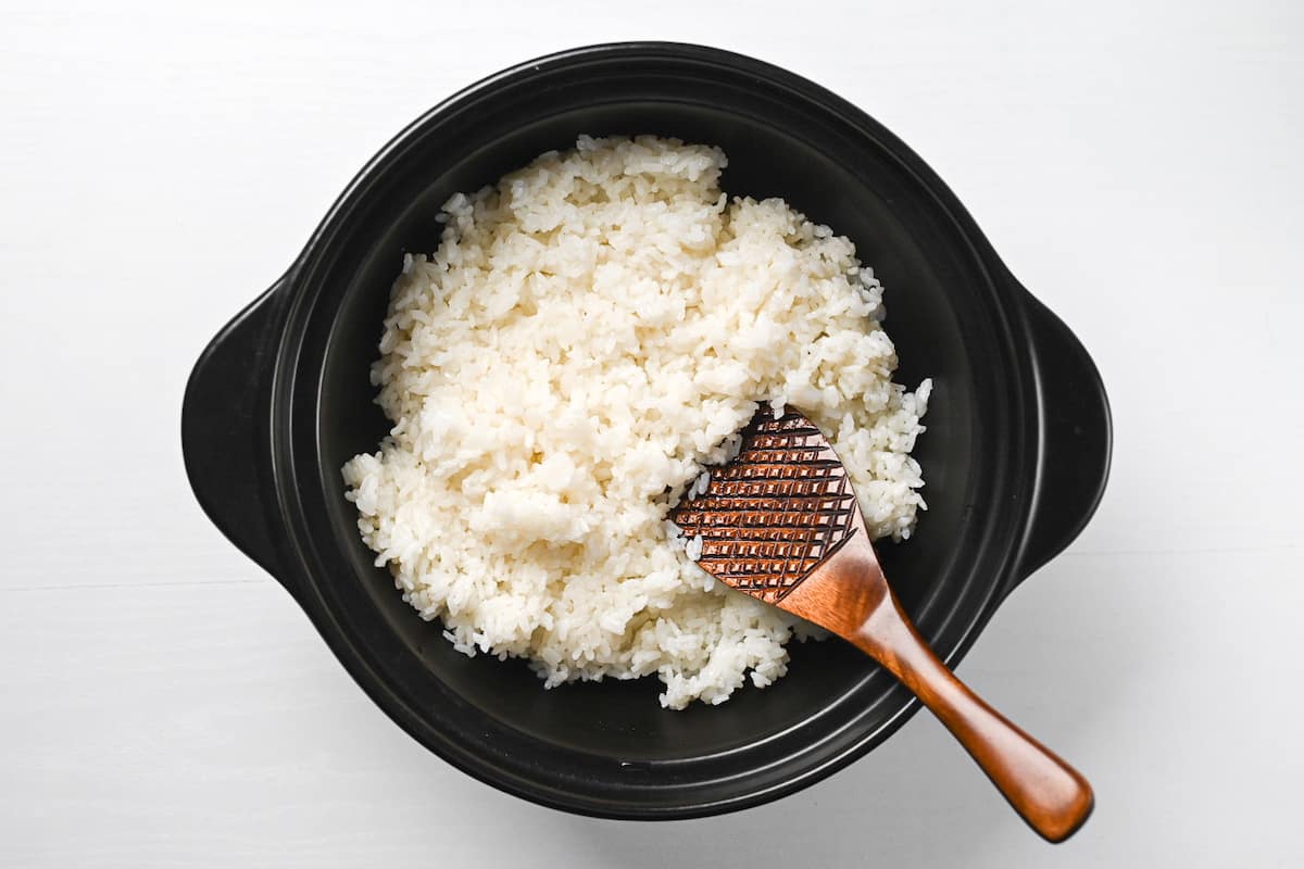 mixing rice to fluff it up