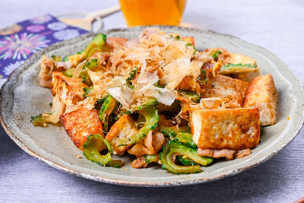 Goya Champuru (Okinawan Bitter Melon Stir Fry) on a grey plate