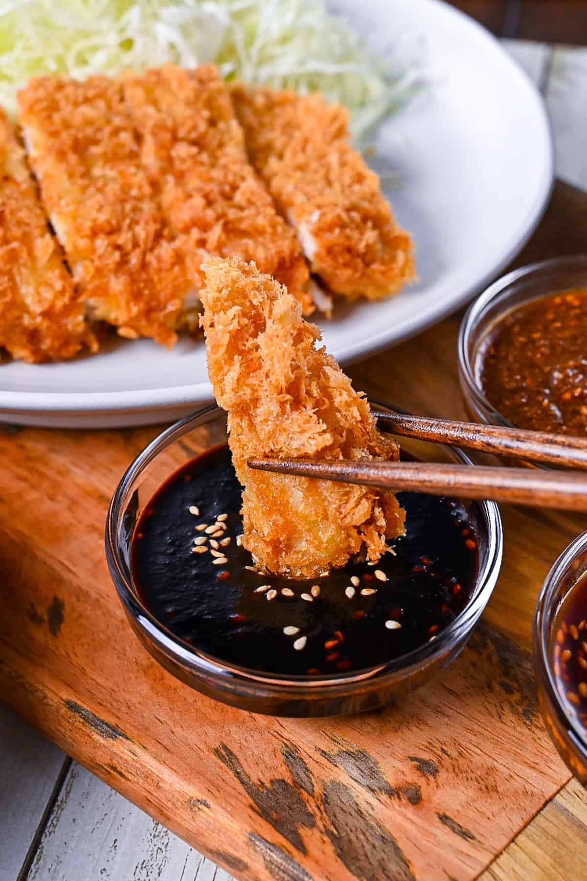A piece of tonkatsu dipped in Nagoya style red miso sauce