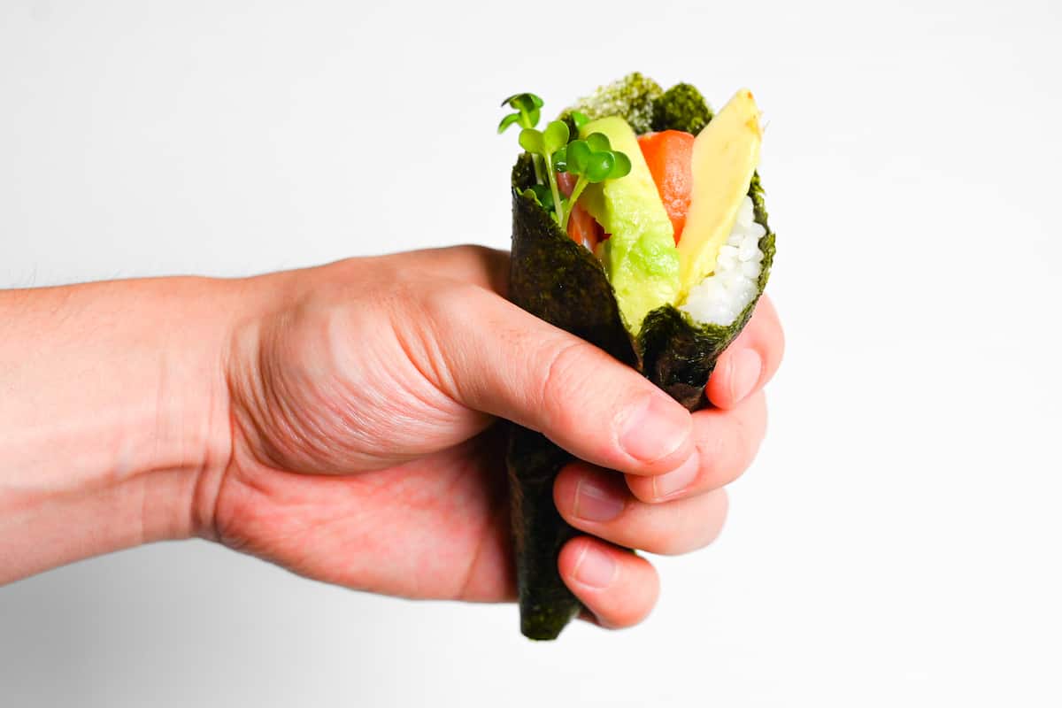 salmon and avocado temaki sushi hand roll