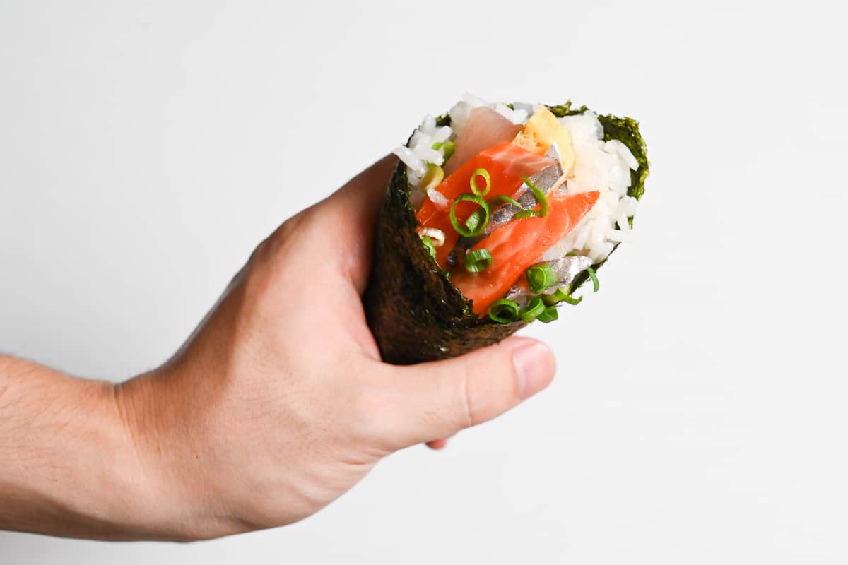 sashimi and dashimaki tamago temaki sushi hand roll