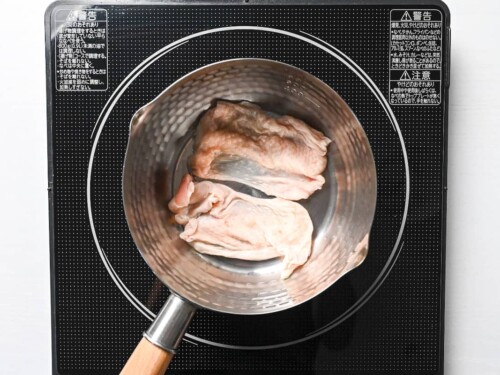 chicken skin in a pan