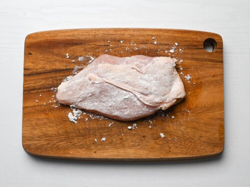 chicken breast coated in a thin layer of corn starch