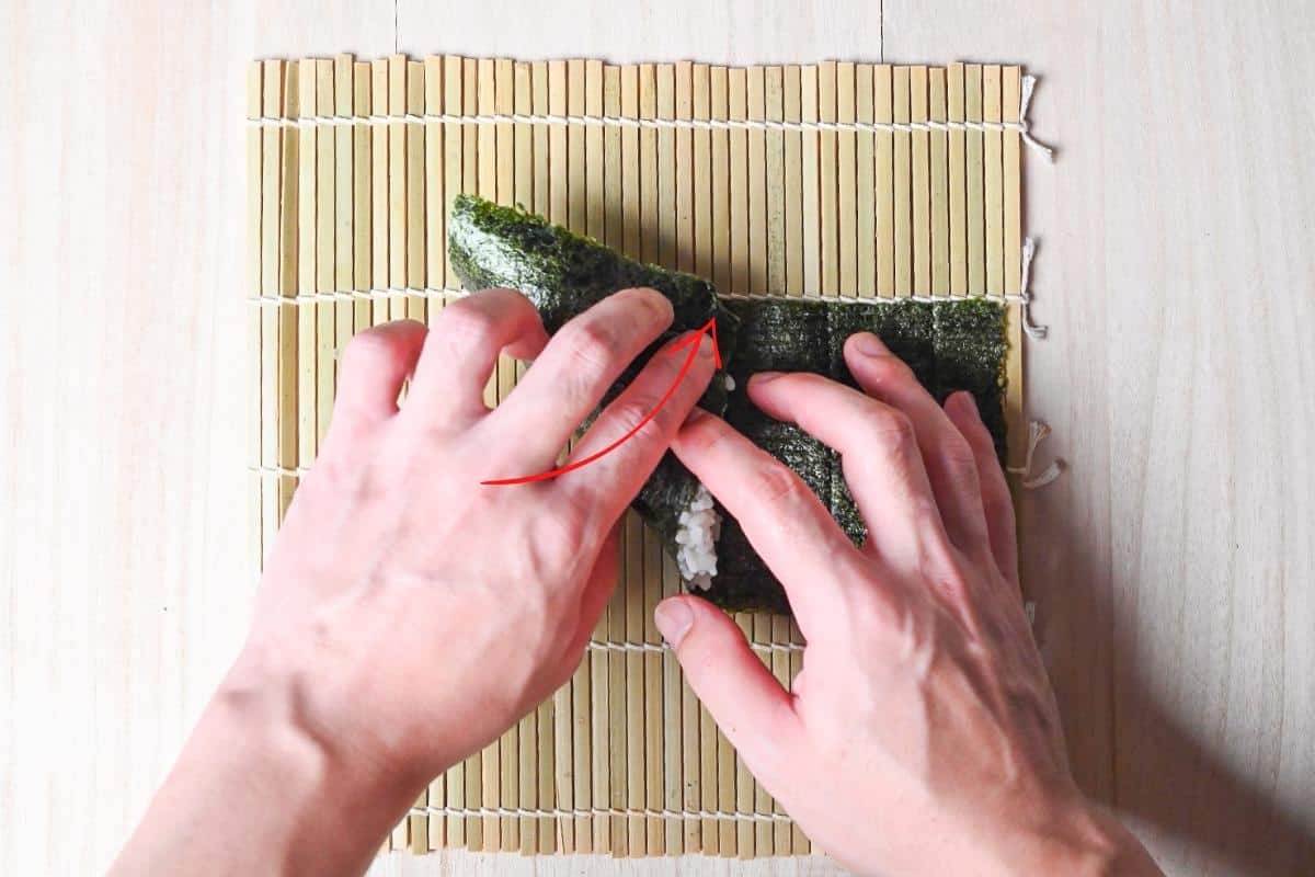 rolling temaki sushi hand roll