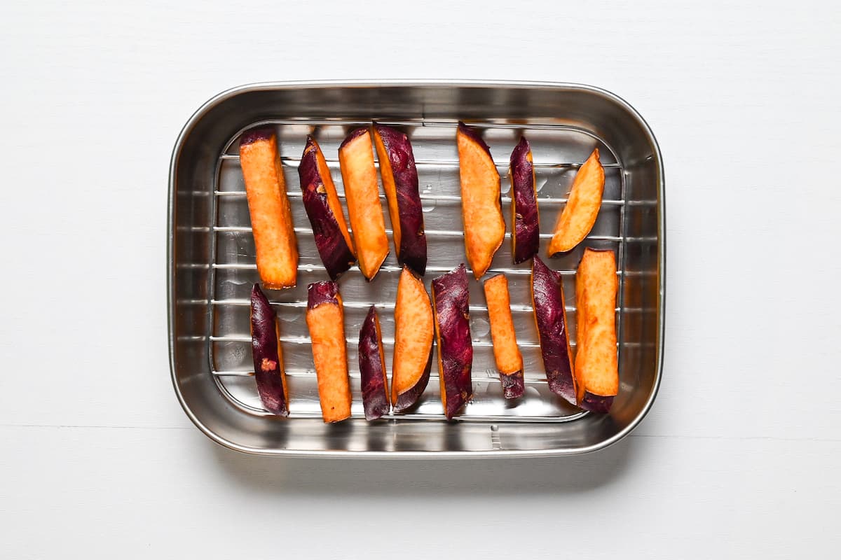 Deep fried Japanese sweet potato on a wire rack