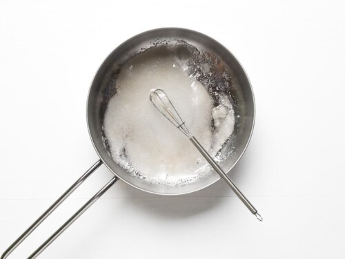 Sugar, mirin, water and rice vinegar mixed in a thick base saucepan