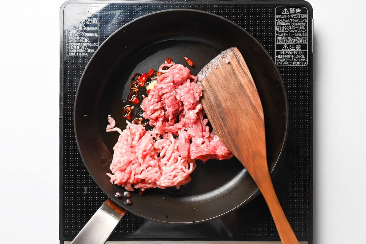 ground pork in a frying pan