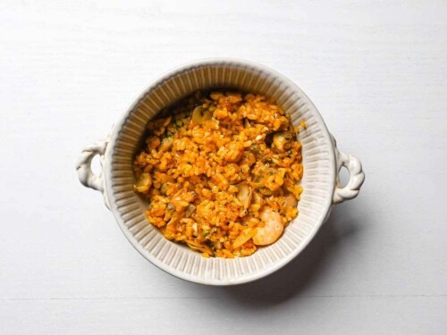 spiced seafood rice in an oven proof dish