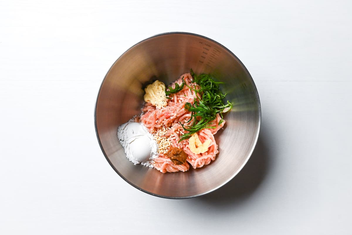 chicken tsukune meatballs in mixing bowl