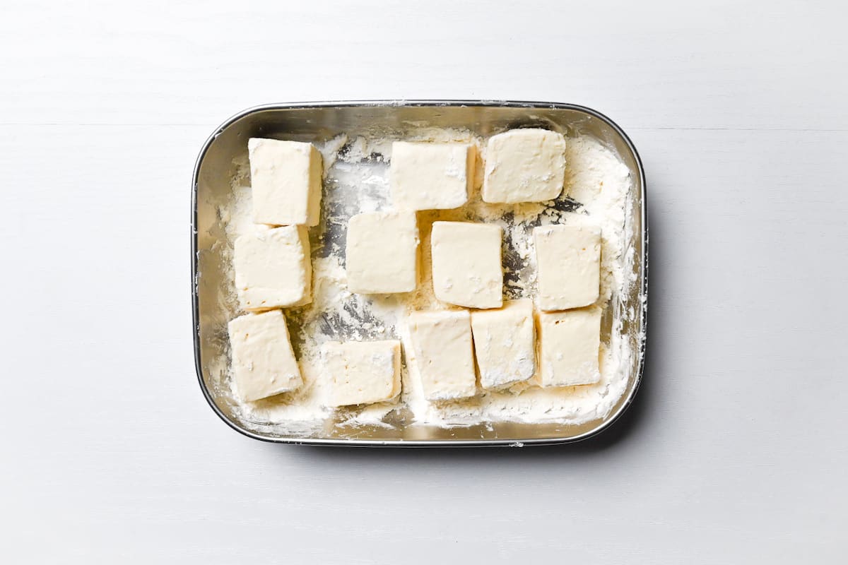 firm tofu coated in a mixture of potato starch and flour