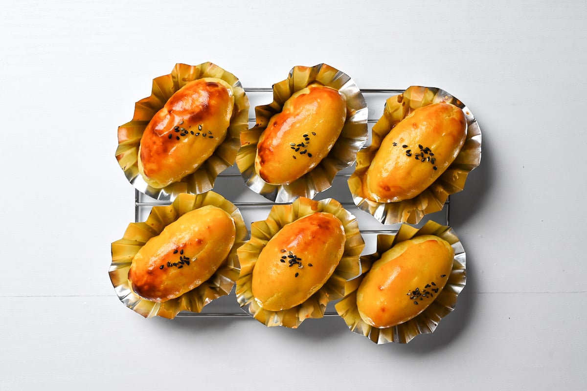 Baked sweet potato cooling on a wire rack