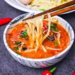 Ramen noodles dipped in a spicy tsukemen soup