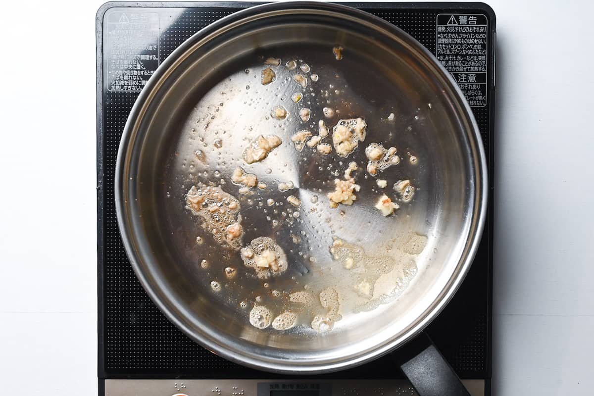 butter and garlic frying in a pan