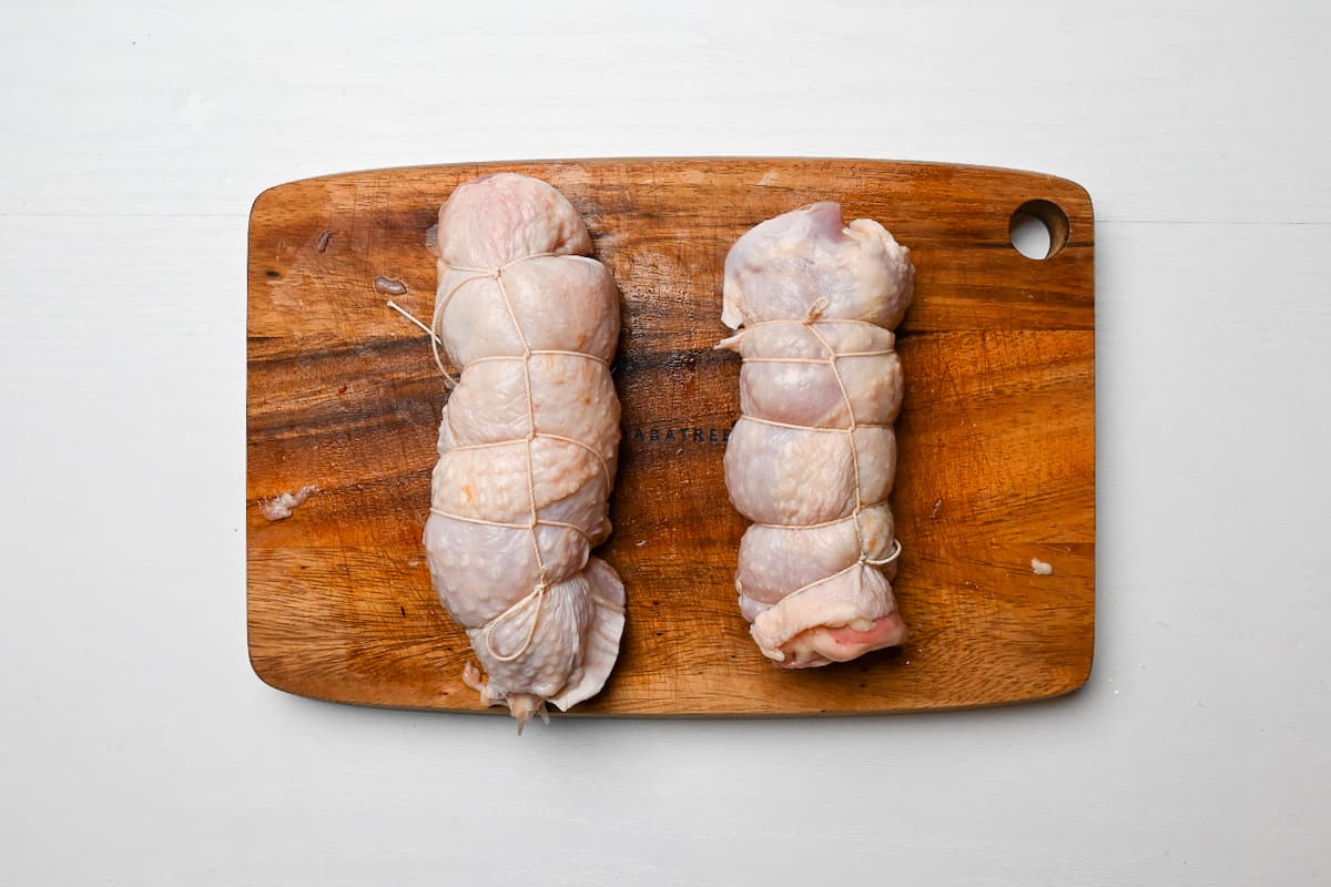 Chicken thigh rolled into a cylinder and tied with butchers twine