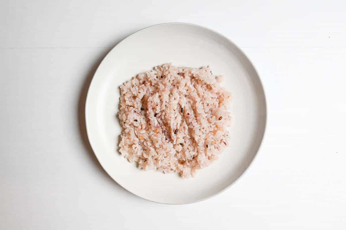Mixed grain rice on a white plate