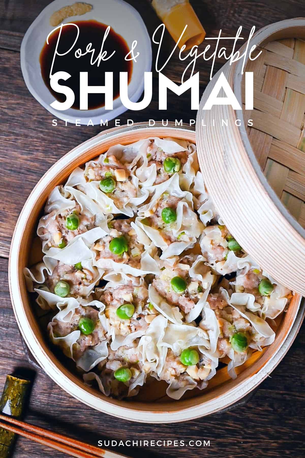 "Shumai" steamed pork dumplings in a bamboo steamer next to soy sauce and karashi mustard