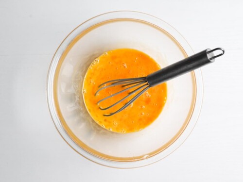 eggs whisked in a glass bowl