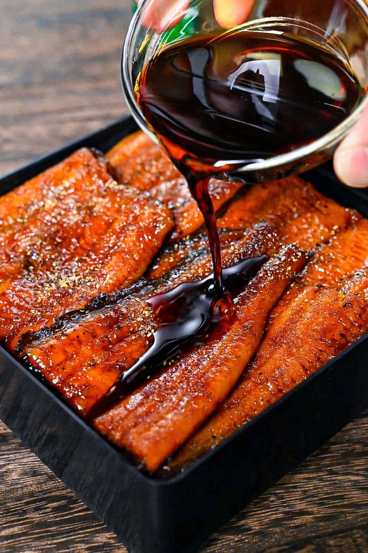 Unagi sauce poured over grilled eel