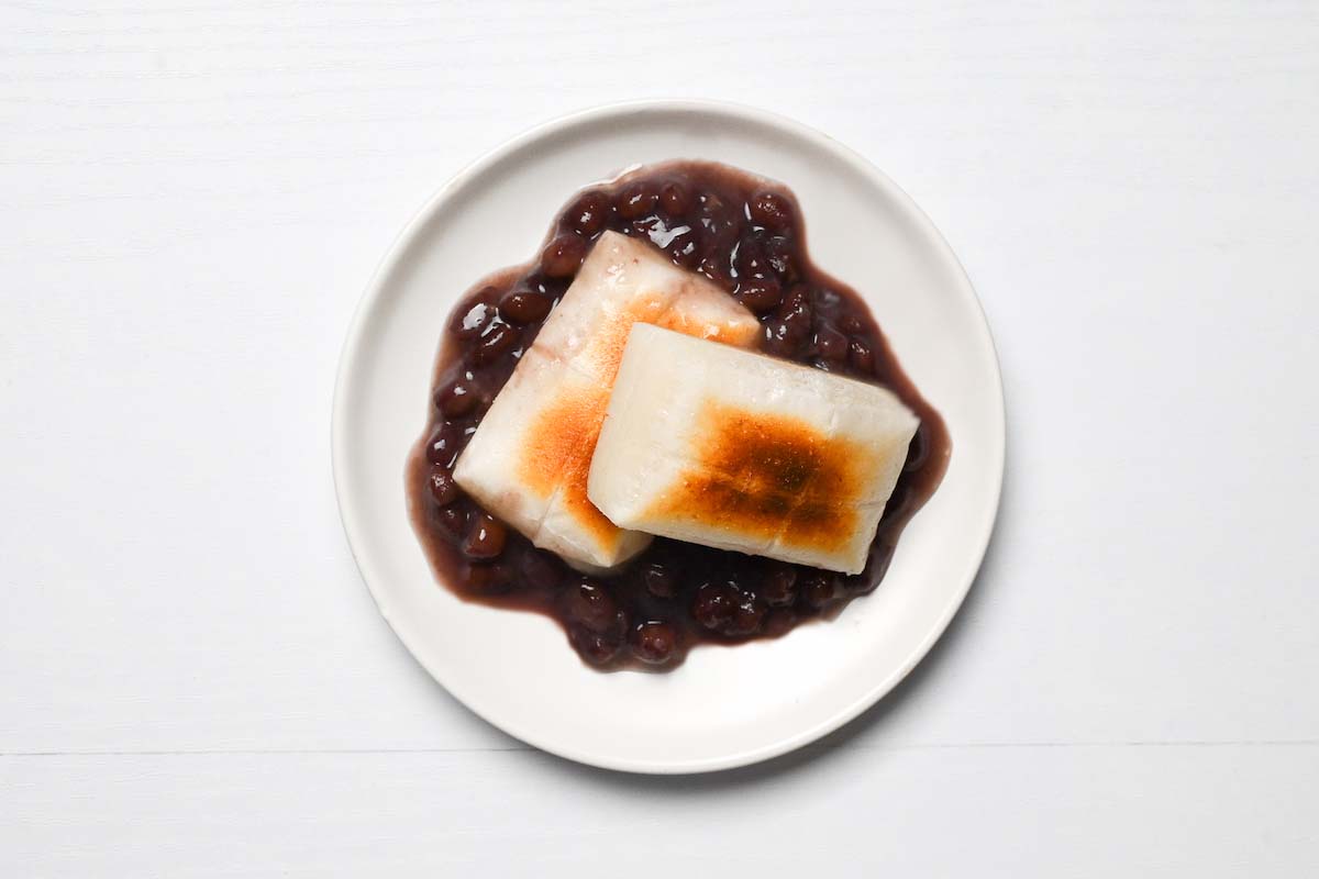Zenzai, toasted red mochi topped with boiled red beans