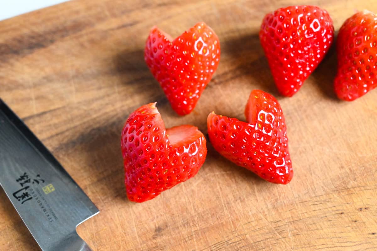 Strawberries cut into heart shapes.