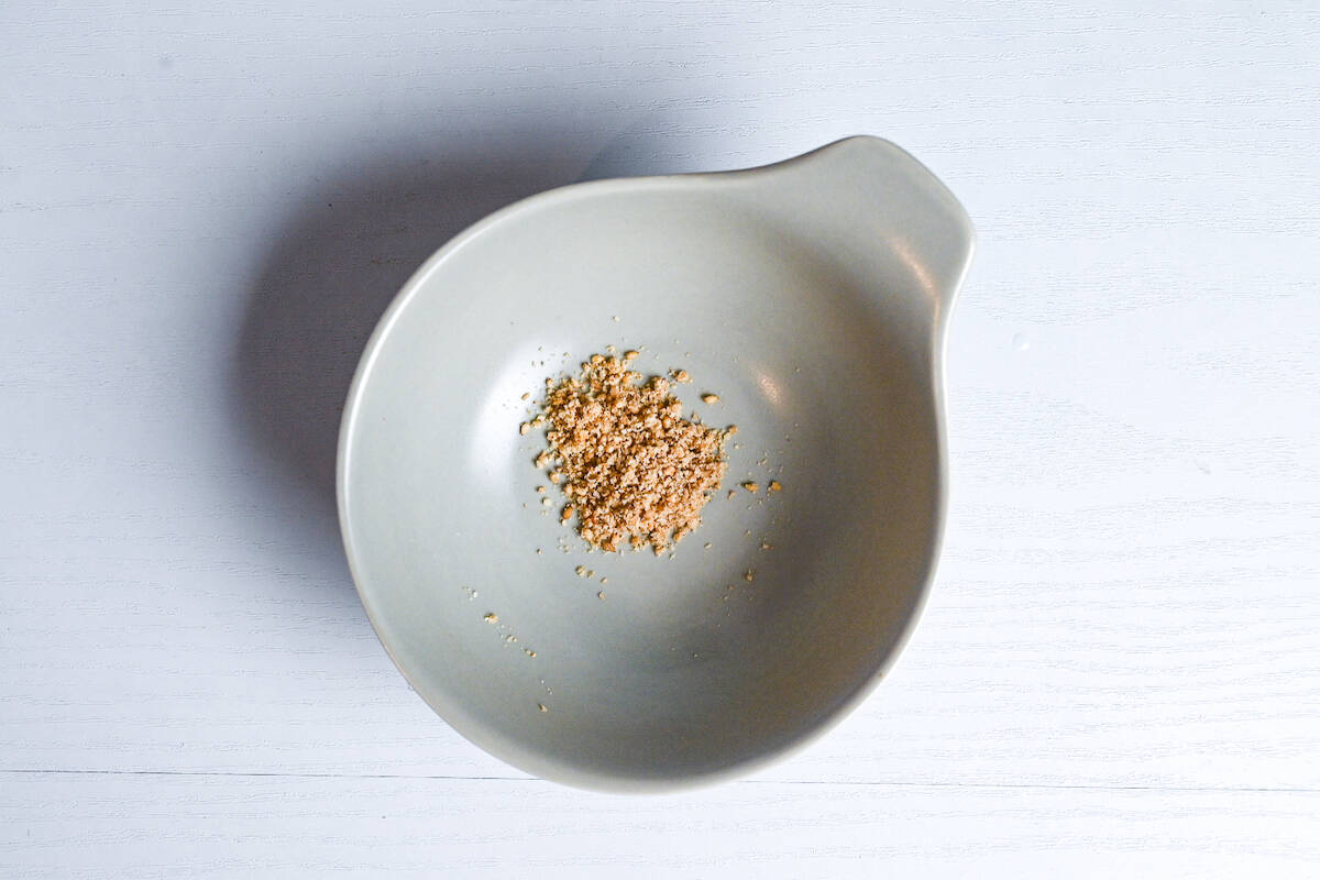 Ground sesame in a gray serving bowl