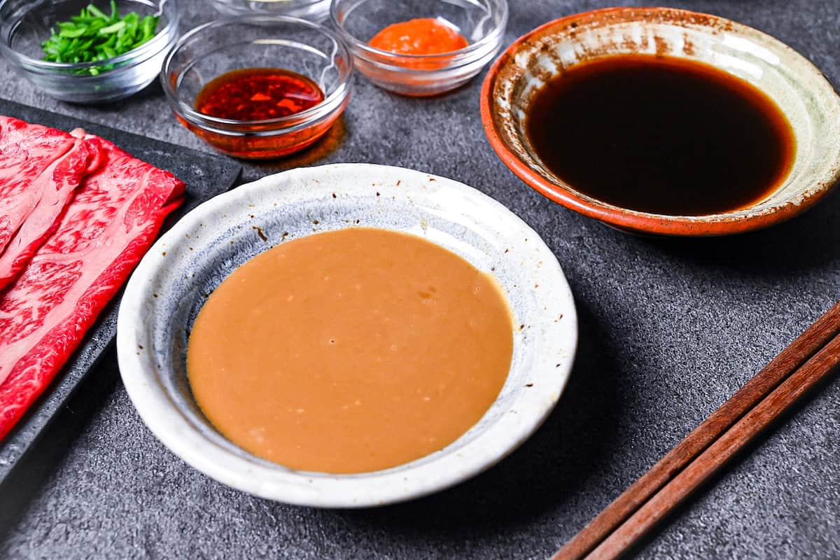 Shabu shabu sesame sauce and ponzu sauce side by side