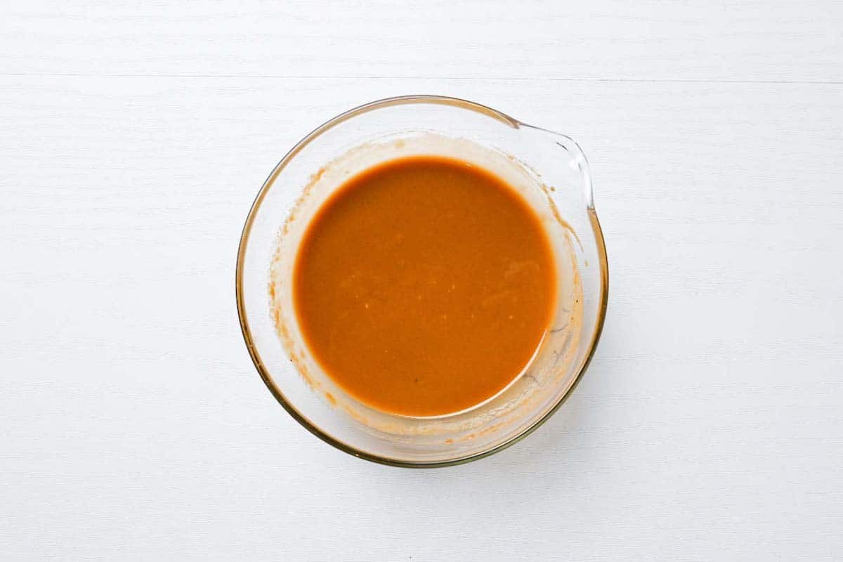 Shabu shabu sesame sauce mixed in a glass bowl