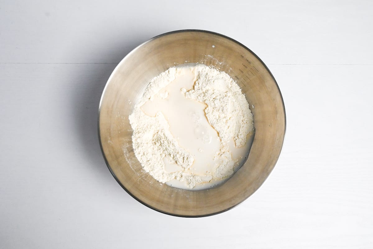Dry ingredients for nikuman dough with milk and yeast mixture added