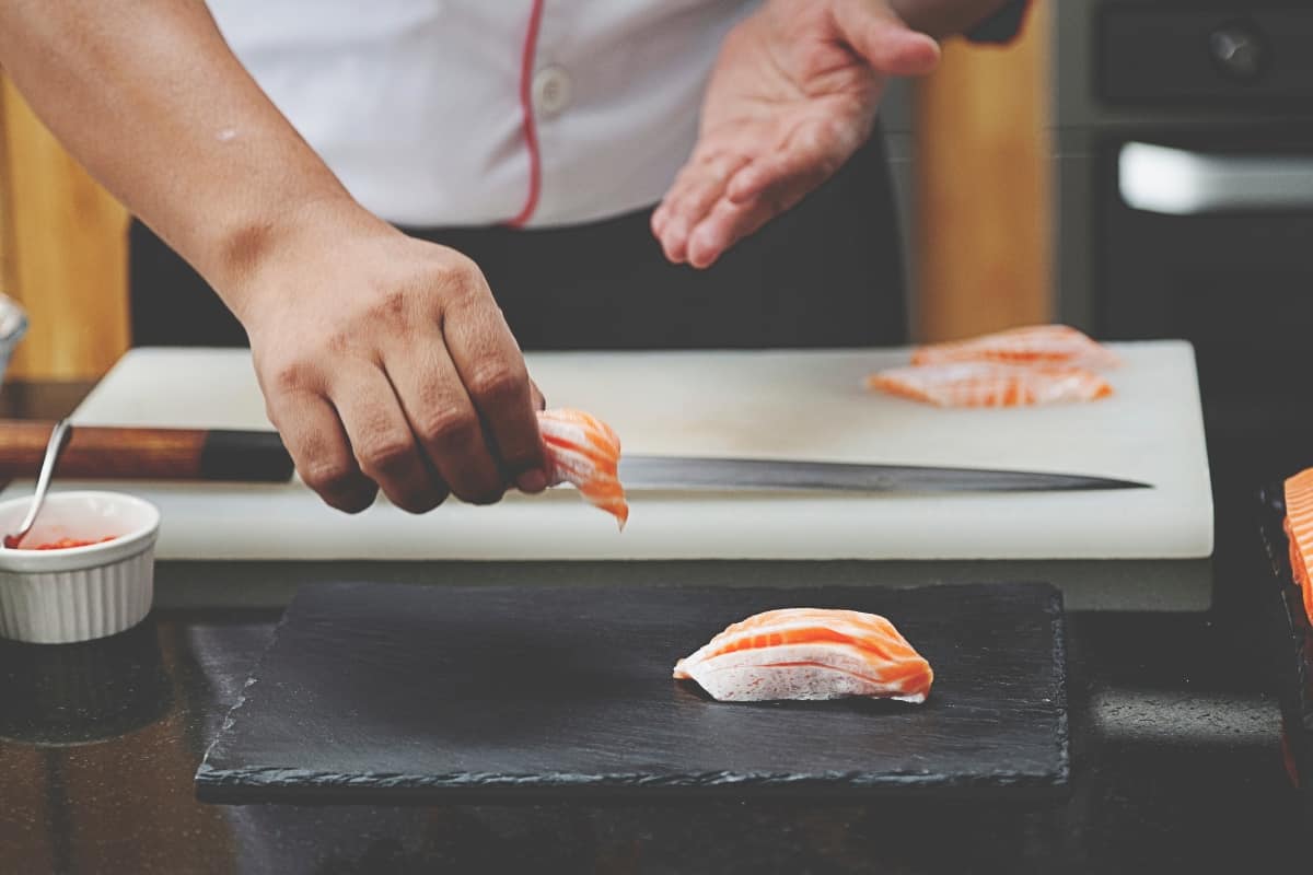 sushi chef crafting nigiri