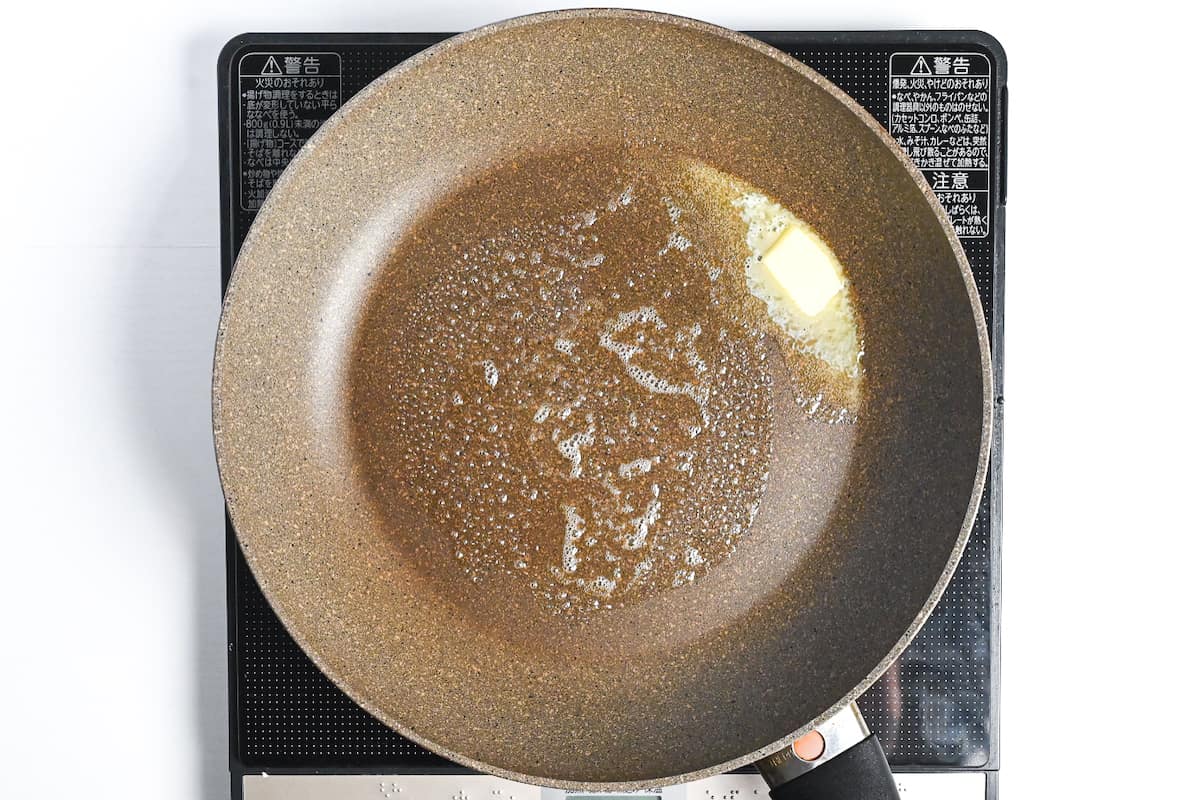 Melted butter in a frying pan