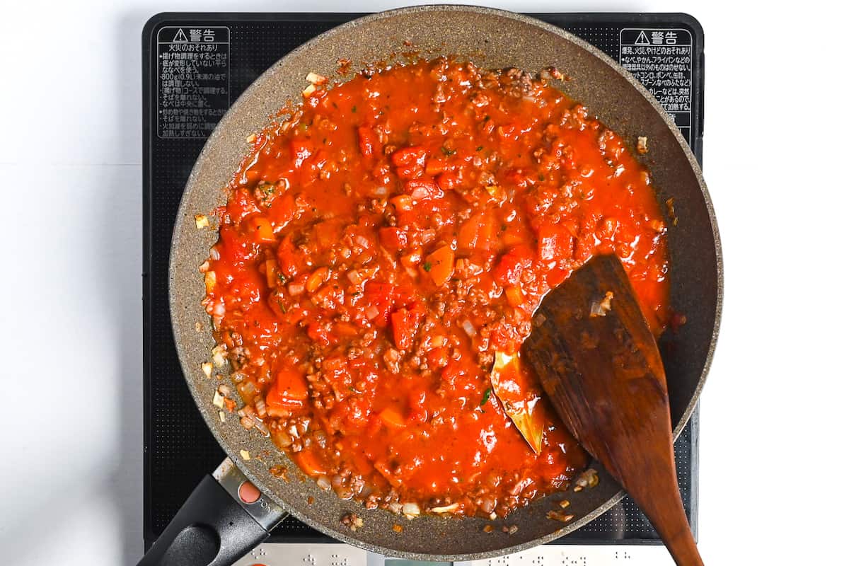 Japanese spaghetti meat sauce simmering in a large frying pan