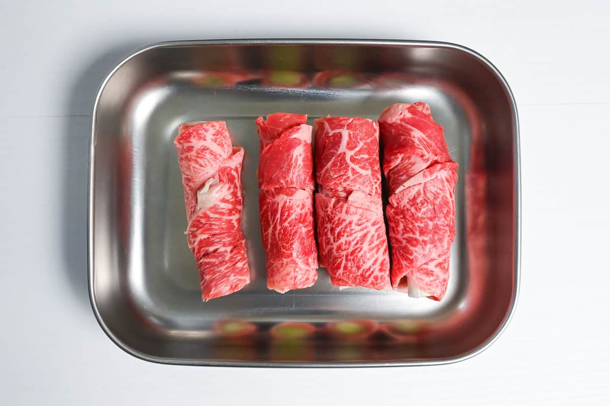 Spring onion wrapped with thinly sliced beef
