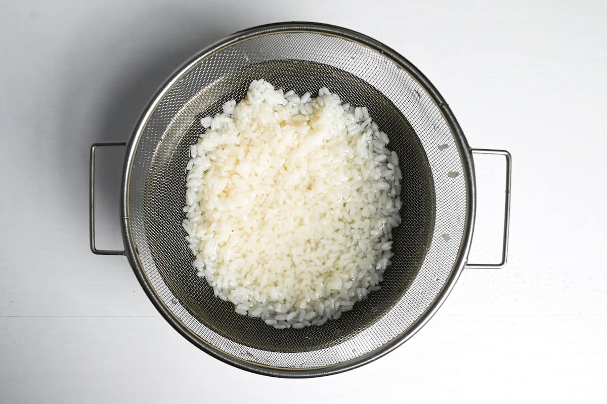 Washing cooked rice