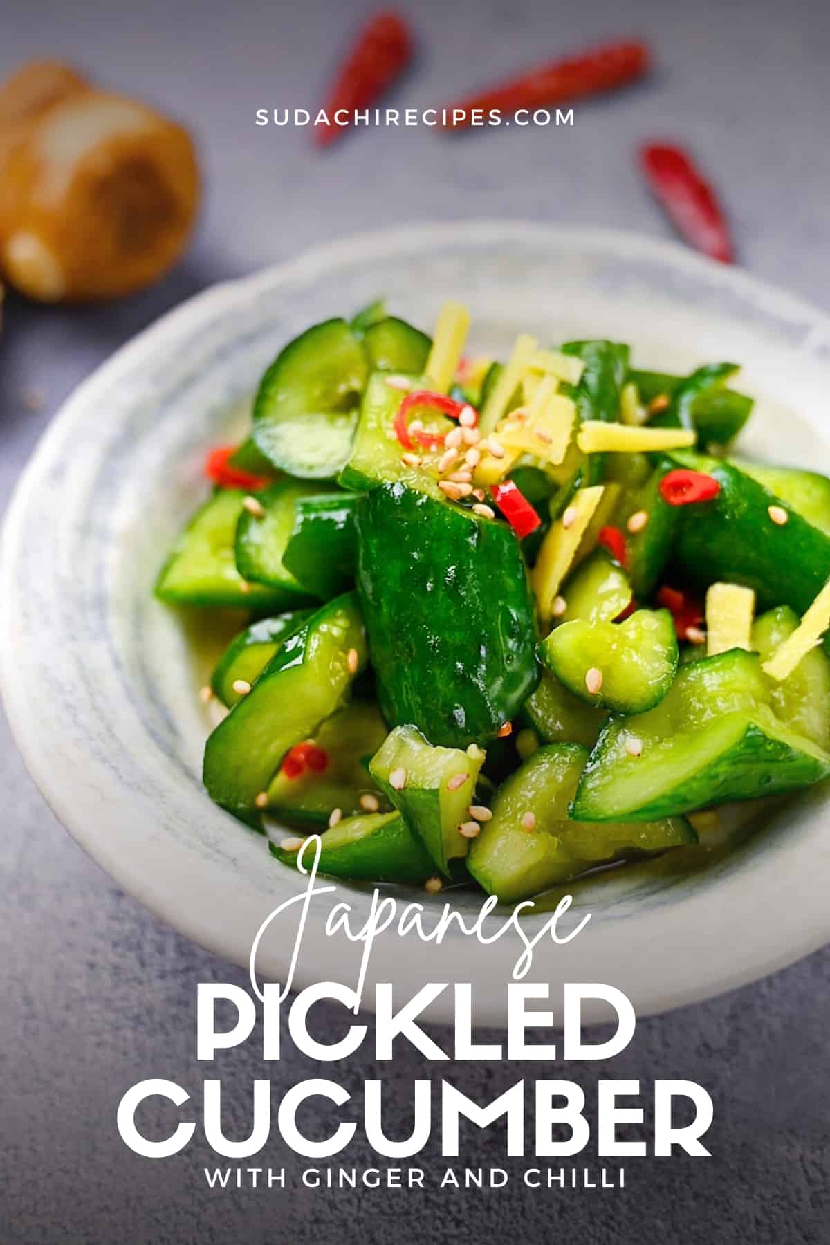 Japanese pickled cucumbers with ginger and chili in a white dish