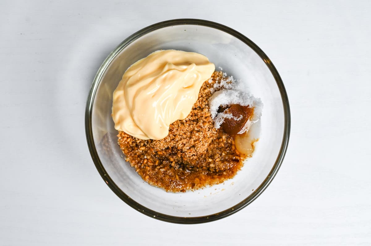 Japanese sesame dressing ingredients in a glass bowl