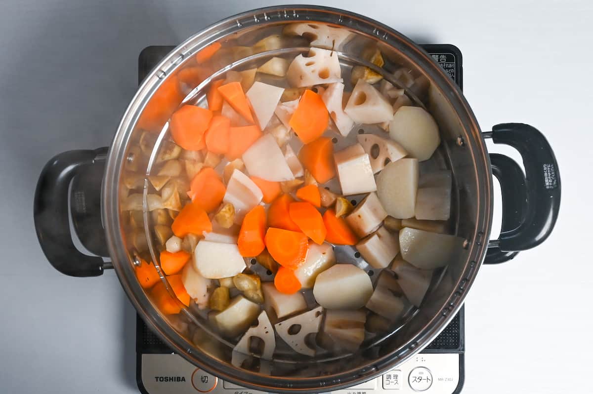 steamed carrot, taro, burdock root and lotus root