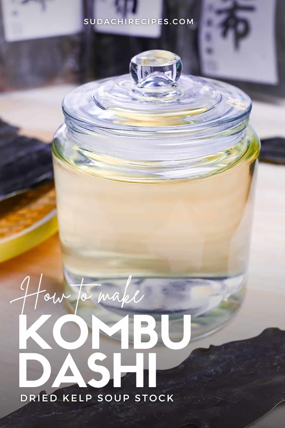 Kombu dashi in a sealed glass jar surrounded by kombu